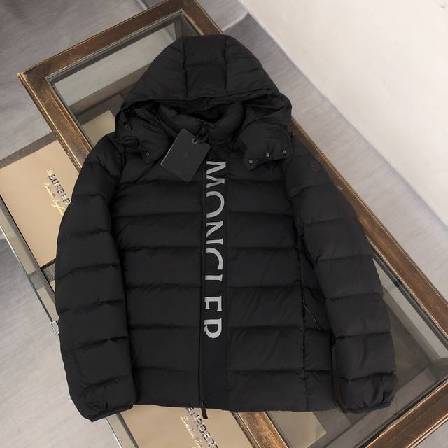 Moncler's new Ume Black Label Black Samurai short down jacket has a detachable h