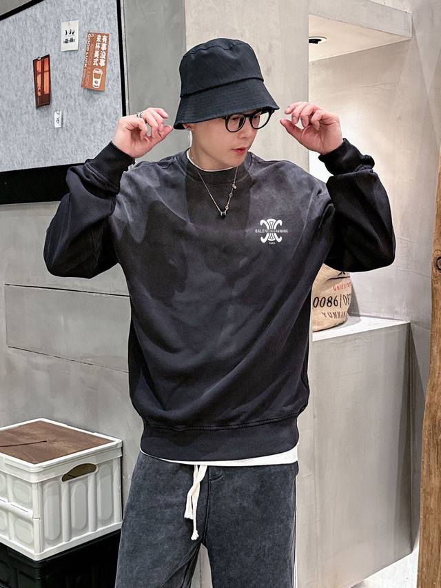 Balenciaga's official website features a new double-layered monogram print. Whe