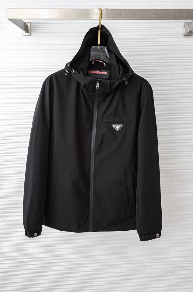 pra*Da's new Fall/Winter 2025 collection features a detachable hooded waterproof