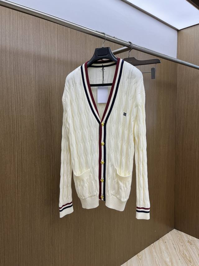 Celine's Autumn/Winter 2025 cream-white knitted cardigan features a delicate and