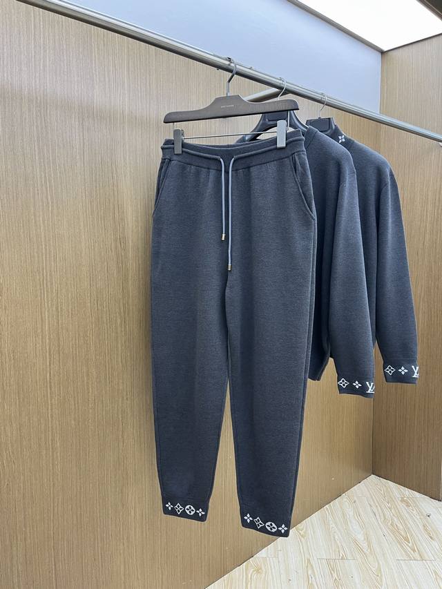 Louis Vuitton's new Fall/Winter 2025 suits. Classic logo-lettered wool suits, fe