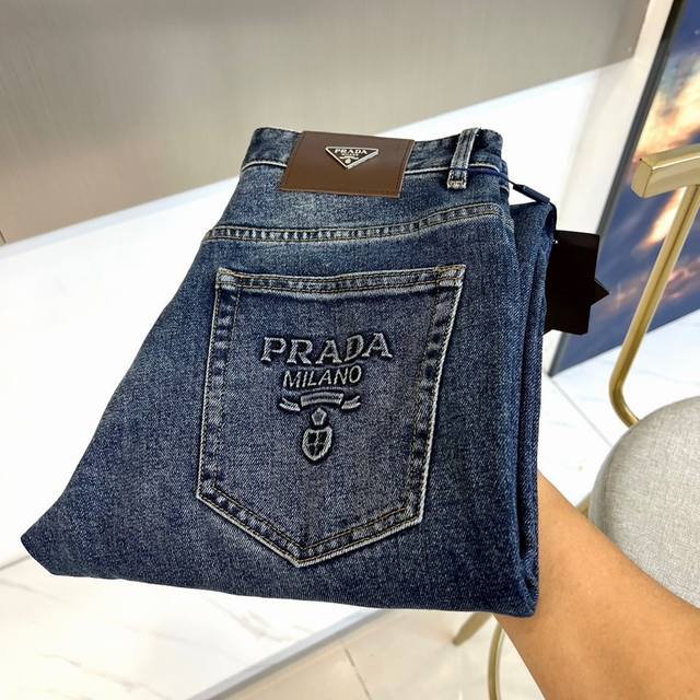 prad, the new men's dark blue jeans for autumn and winter 2025, interpret the It