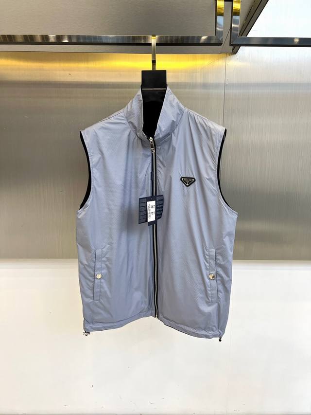 Prada's reversible vest for Fall/Winter 2025 reimagines functional fashion with
