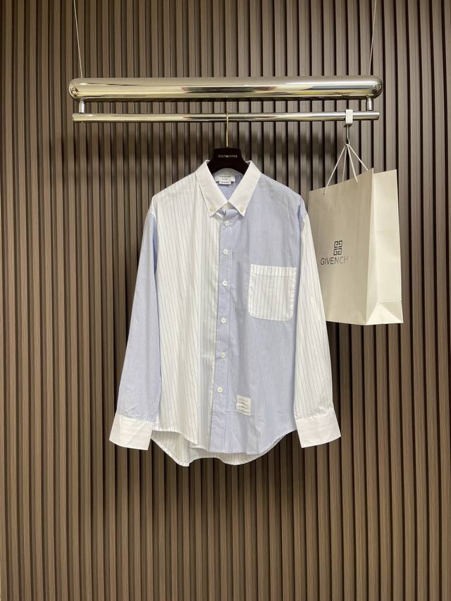 Tb Thombrowne's colorblock striped long-sleeved shirt has a casual, loose fit th