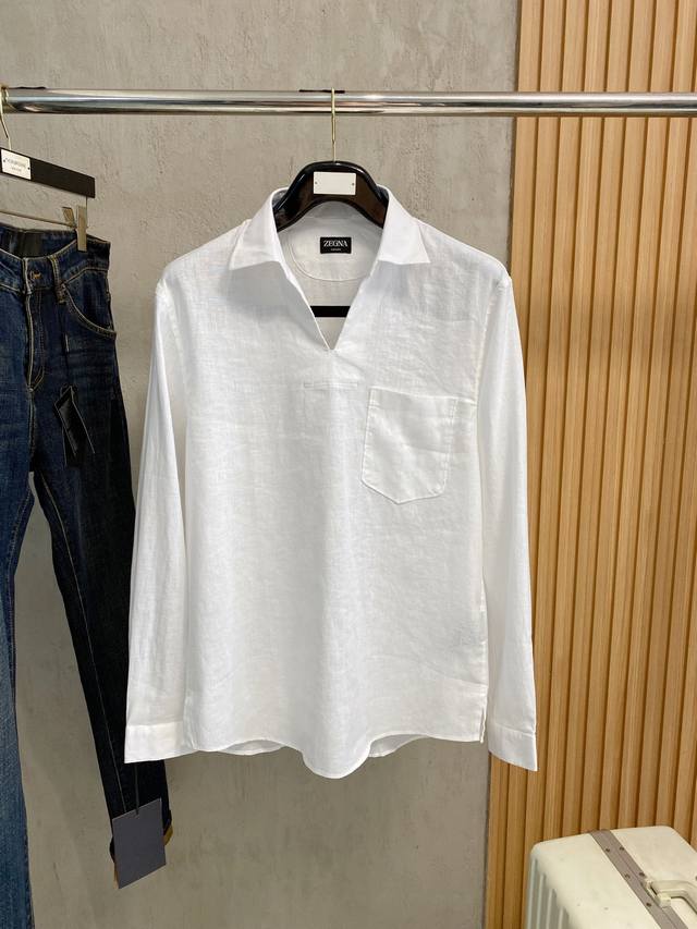 This epic linen shirt, an exclusive special edition, features a multi-colored e
