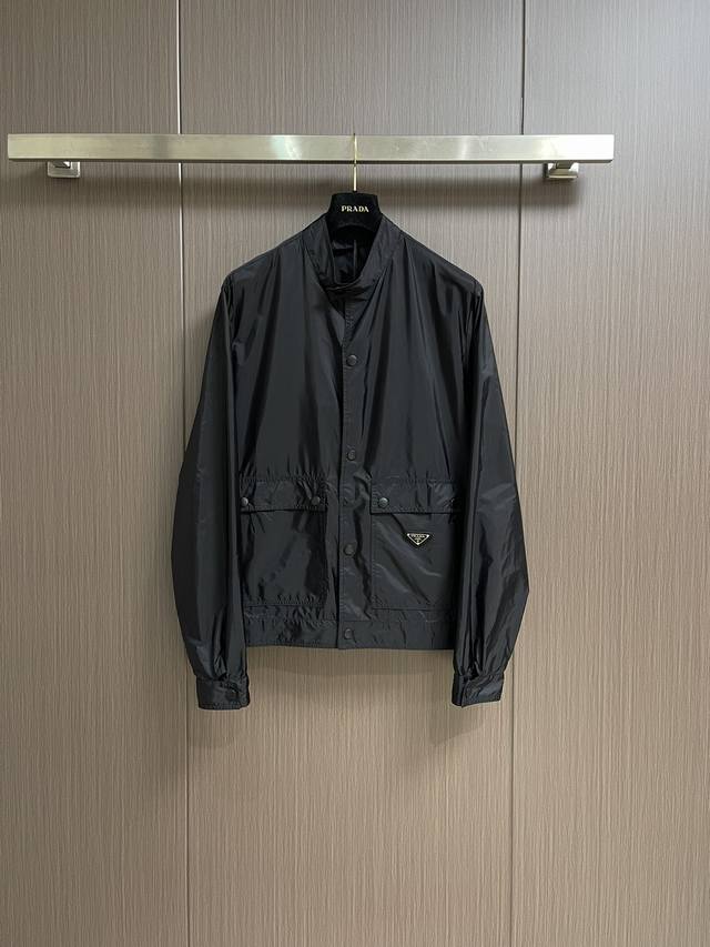 Outerwear This Prada recycled nylon jacket and trousers set features the brand'