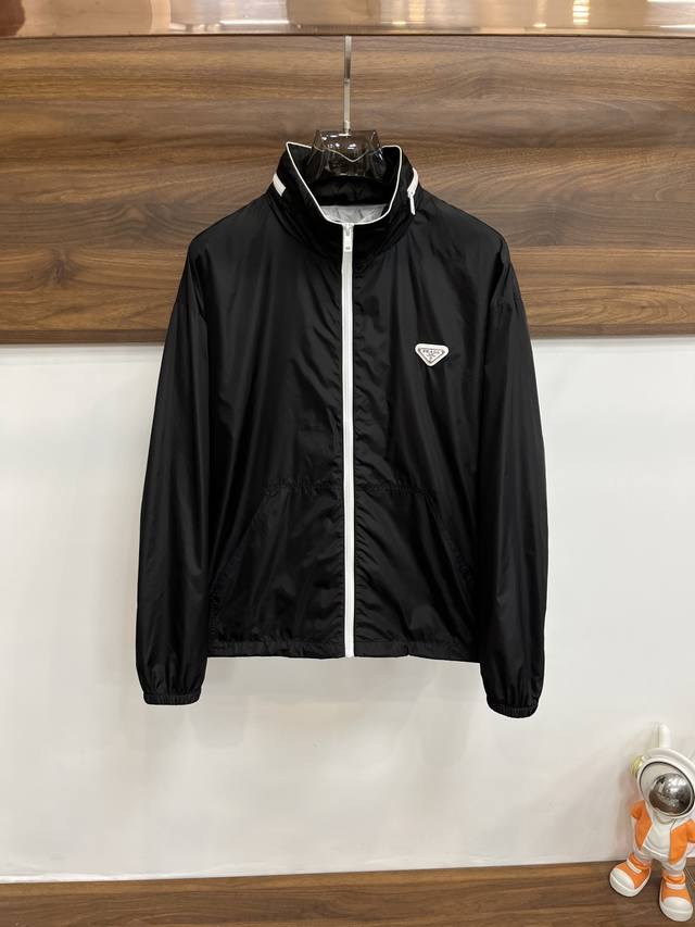 Featured: Prada's new 25Ss stand-up collar recycled nylon jacket. This recycled