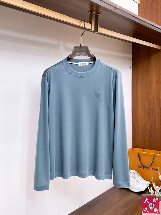 Boss's stylish, minimalist early autumn long-sleeved base shirt is renowned for