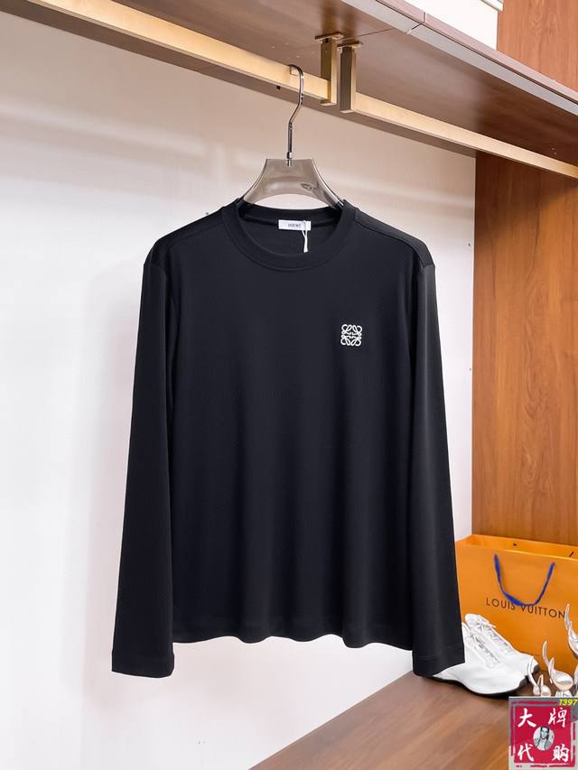 Loewe's stylish, minimalist early fall long-sleeved base shirt is renowned for