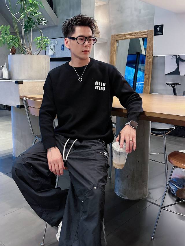 Miumiu Round Neck Crochet Pullover Sweater . This sweater is luxuriously soft a