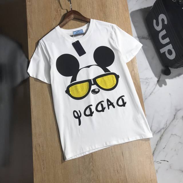 Prada's new Prada hot-drilled Disney pattern with a custom metal triangle logo