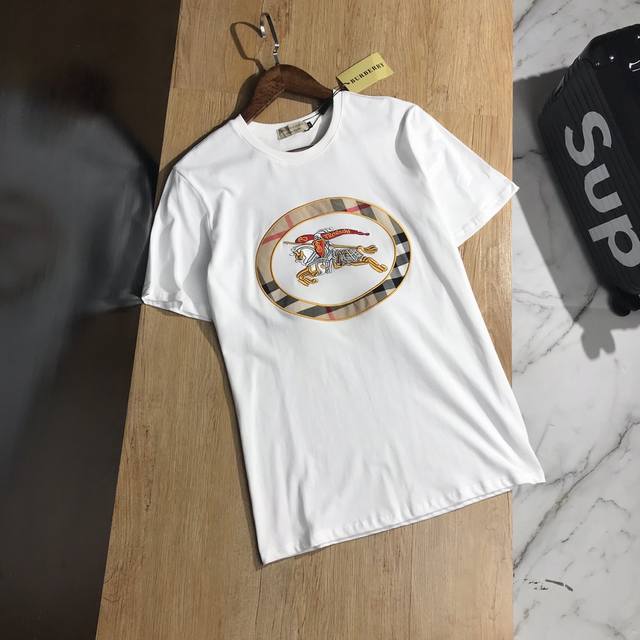 Burberry's classic Warhorse check fabric with 10,000-stitch embroidery. 20Ss G-