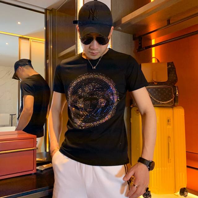 Versace. This year's latest hit short-sleeved T-shirt. Available in store, this