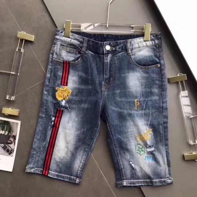 High-end Gucci custom-made slim-fit denim shorts, a recent runway style from th