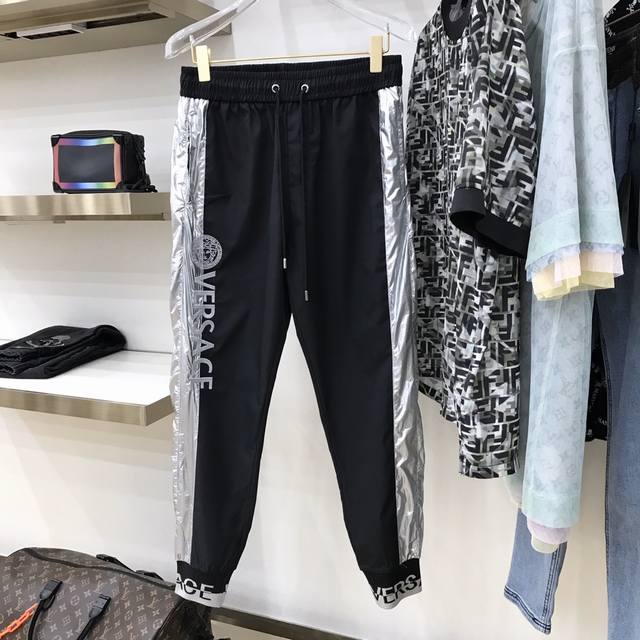 Versac 20S men's casual pants. These thin pants feature a mesh interior for perf