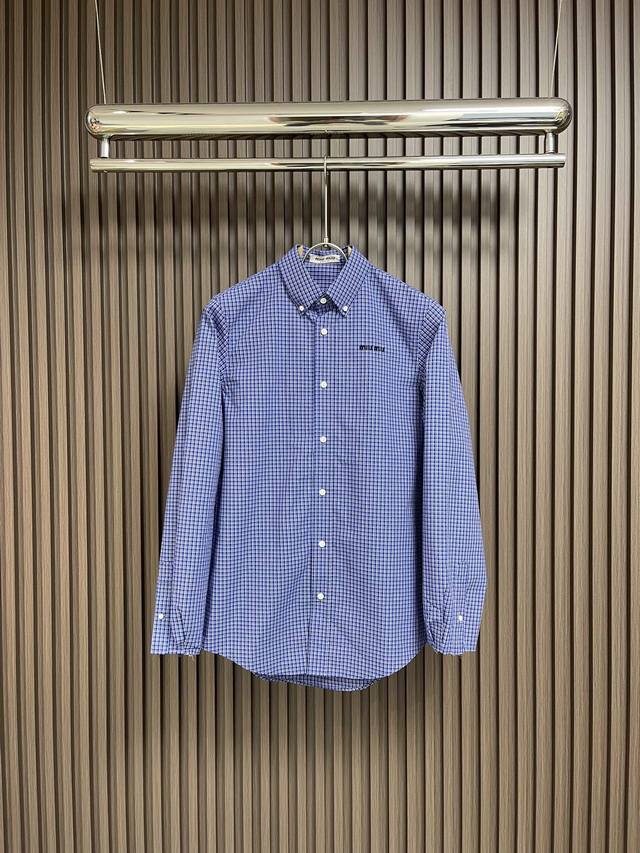 Miumiu SS's new spring/summer collection. This season's hottest plaid shirt, per