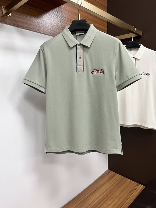 Moncler's classic polo collar design for spring and summer 2025, paired with a s