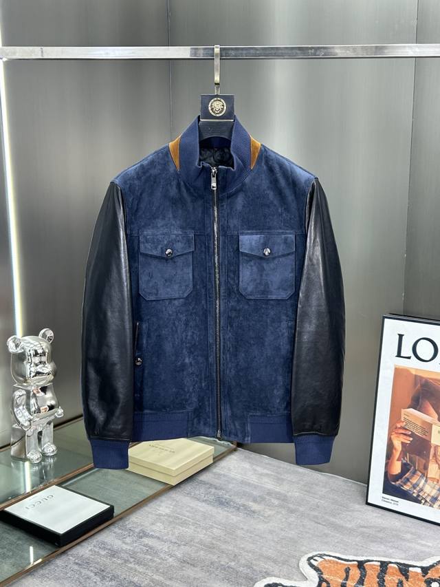 Zegna's latest fall/winter 2025 collection features a stand-up collar with a ne