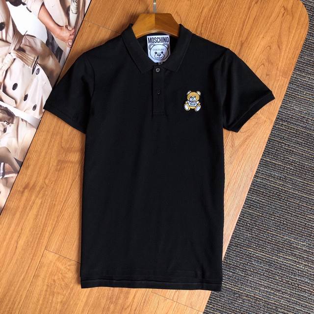 Moschino's latest Spring/Summer men's polo shirt with a reverse collar and shor