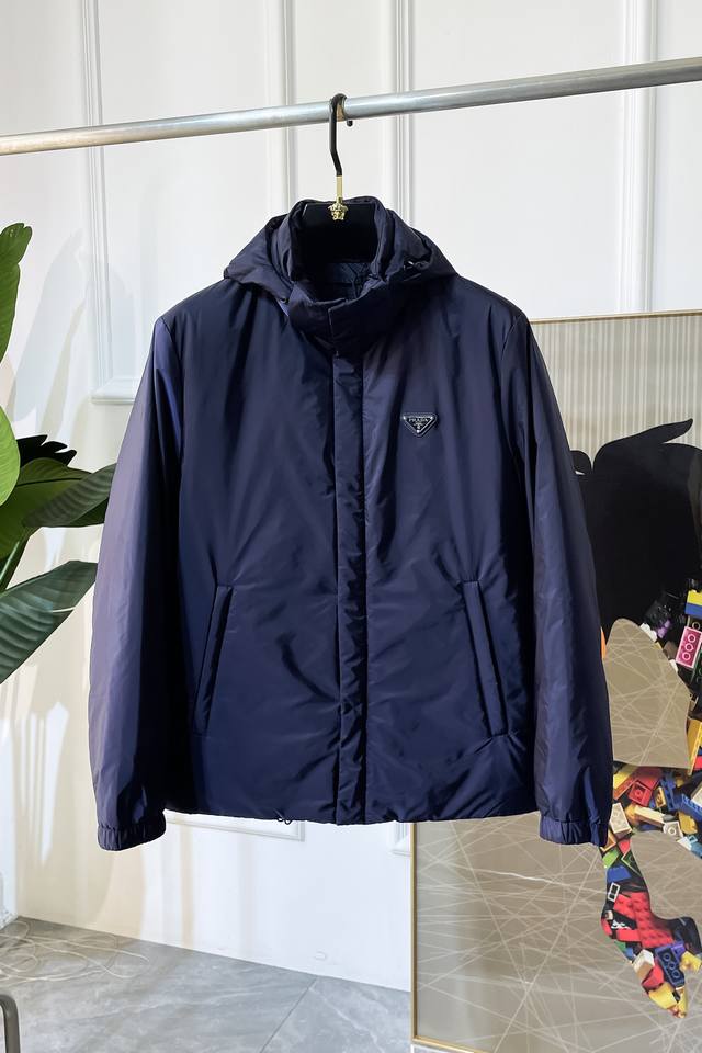 Down Jacket - Prada's exclusive new fall and winter down jacket. Made from nati