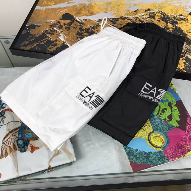 Armani's new summer collection of high-end, original casual beach shorts. Made f