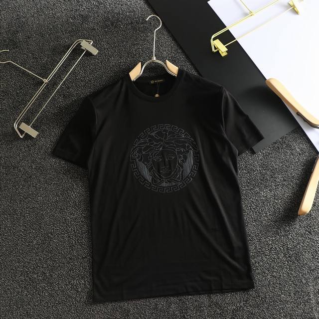 Price: Authentic, silk-finished t-shirt in excellent condition: Versace's lates