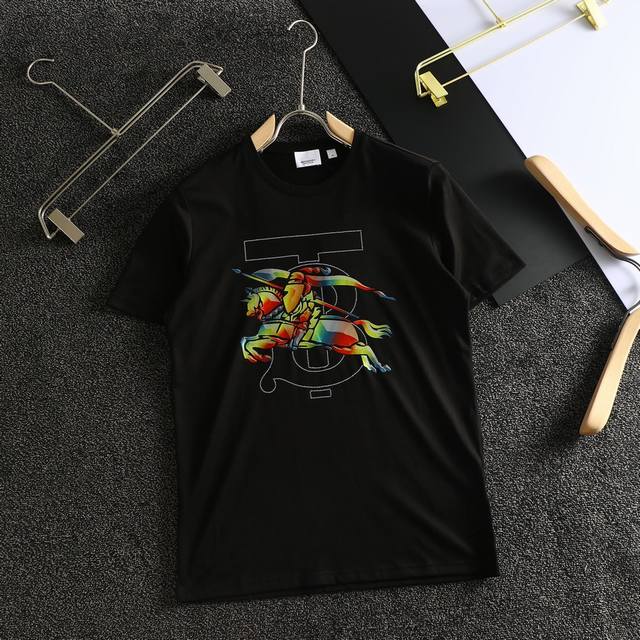 Price: Authentic, silk-finished t-shirt in excellent condition: Burberry's late