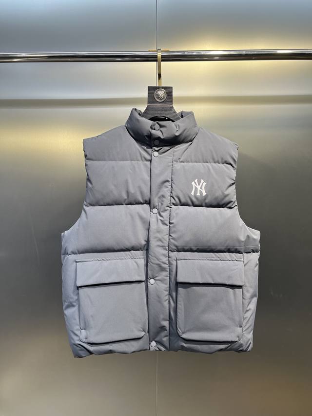 Mlb Down Vest . This lightweight, casual, loose-fitting down vest features a sm