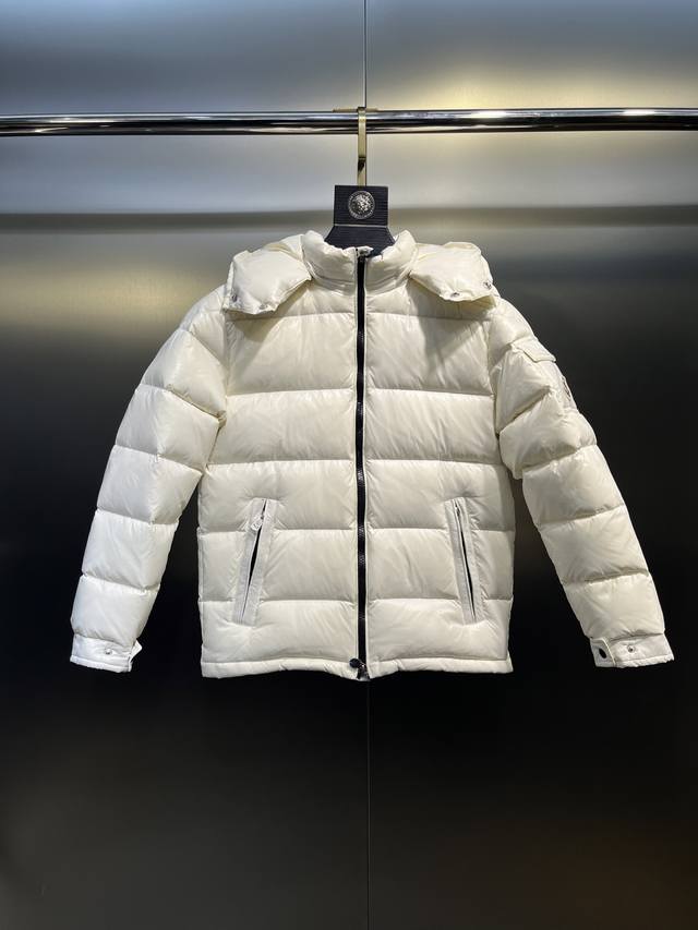 026 Children's Maya Down Jacket . Designed to withstand cold winter weather, th