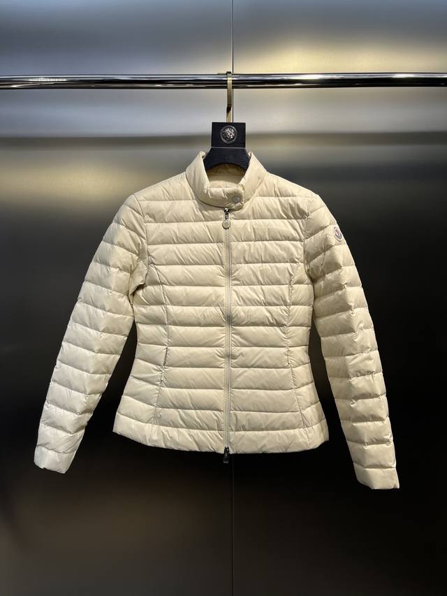 Moncler stand-up collar, waist-hugging down jacket . Heavy horizontal stripes a