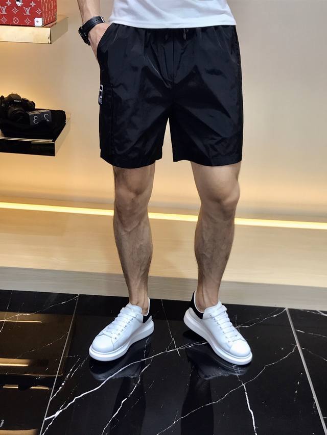 Armani 023 top solid color and cross-style skull embroidered shorts, unique sty