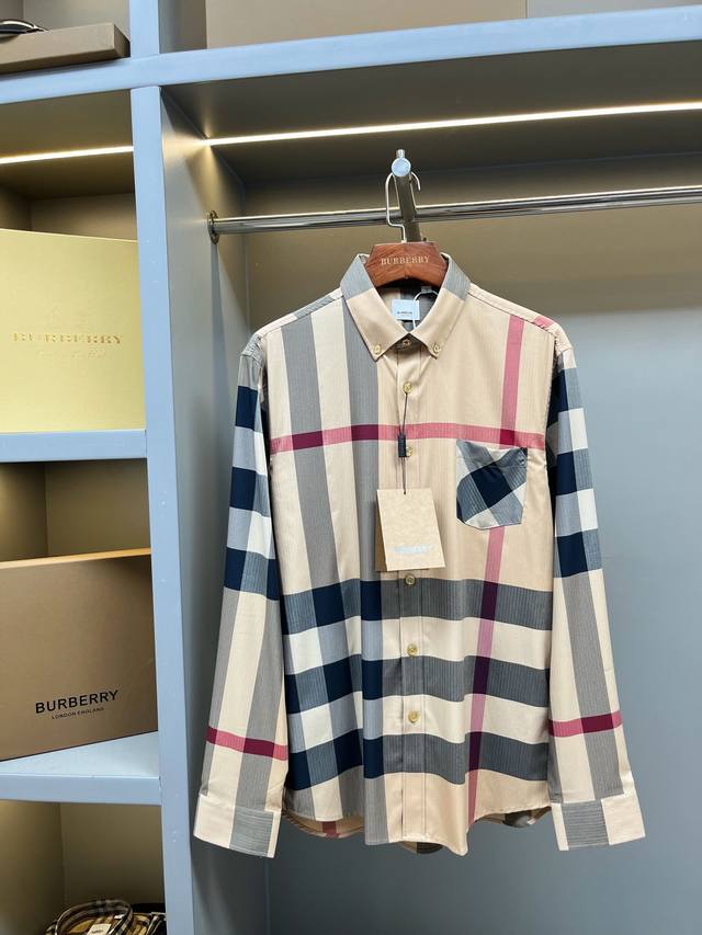 Bur Classic plaid unisex shirt. . Available through our premier channel. . It'