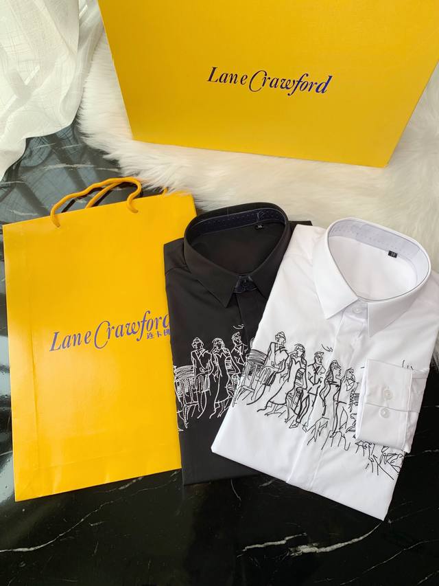 Prada SS new model on the runway with black and white contrasting portrait embr