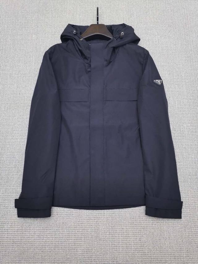 Prada Autumn/Winter 2020 casual hooded jacket. Lightweight and youthful, it fea