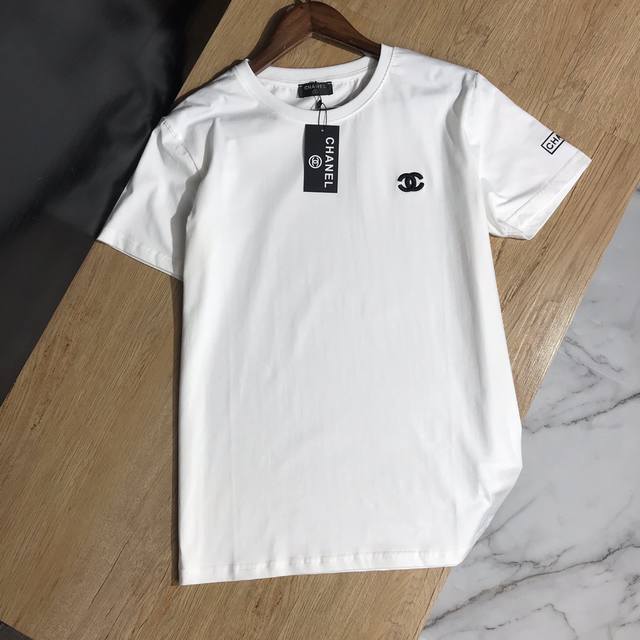 Chanel classic Chanel design with a small 3D logo on the chest and offset printi