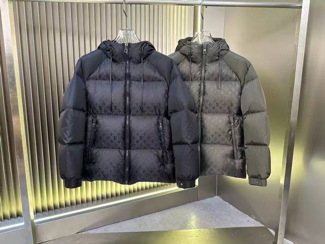 Louis Vuitton. Lv hooded printed down jacket in black and green. Sizes 48, 50, 5