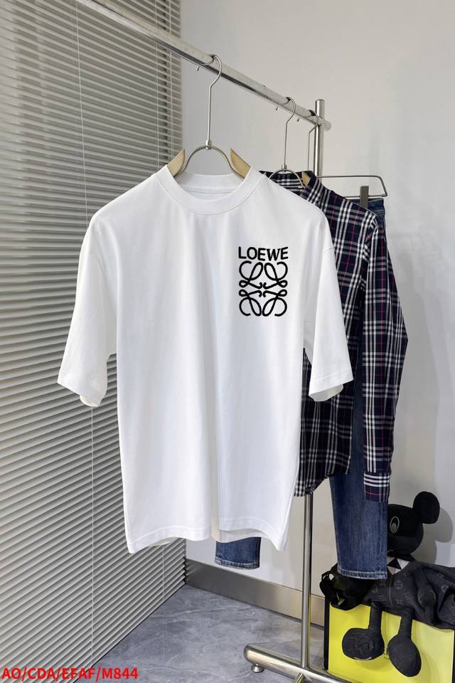 Loewe's new spring/summer collection features a classic logo printed on the che