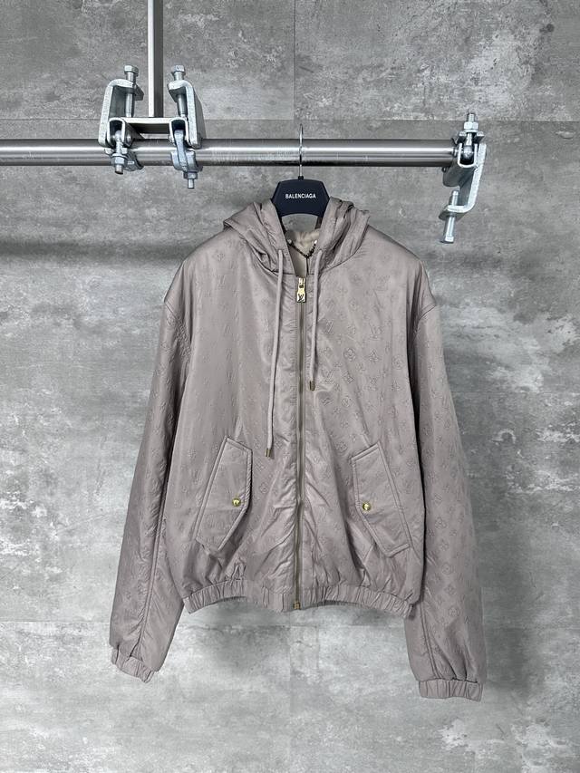 Lv Louis Vuitton's all-over embossed logo jacket. This new hooded windbreaker, f