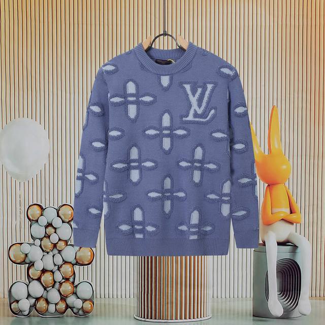 Louis Vuitton's new cross logo design features a embossed intarsia wool knit cre