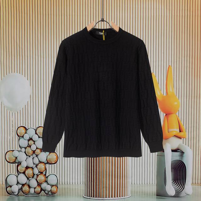 A hot new arrival from Fendi, this exclusive new knitted sweater features a dist