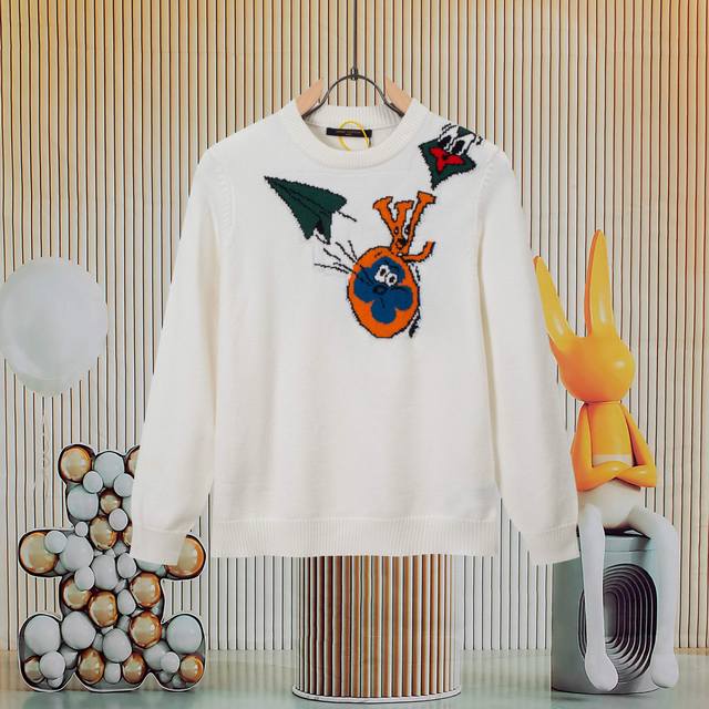 This Louis Vuitton color-block jacquard crew-neck pullover sweater is incredibly