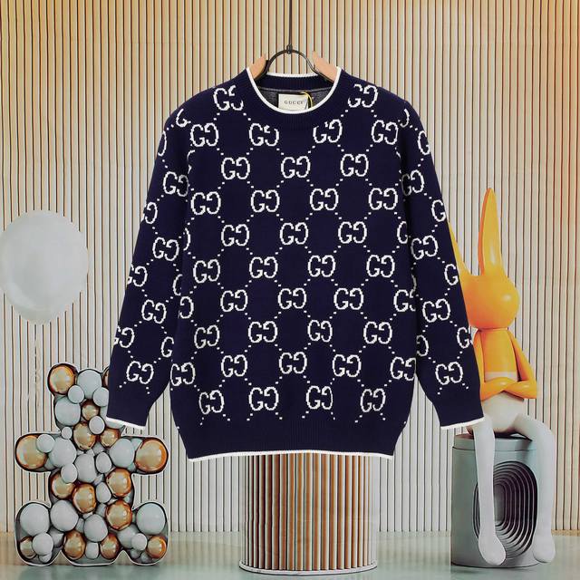 Gucci counters reproduce the top-of-the-line Gg wool jacquard sweater. This blue