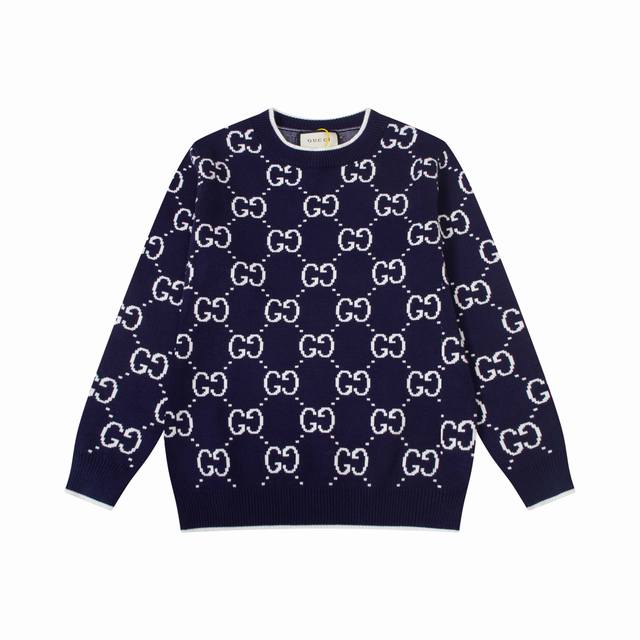 Gucci counters reproduce the top-of-the-line Gg wool jacquard sweater. This blue