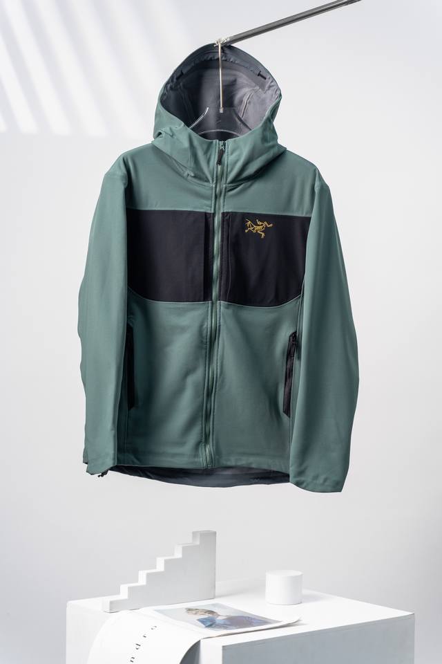 Black, green and gold Arcteryx Gamma Mx Hoody solid color warm soft shell hooded