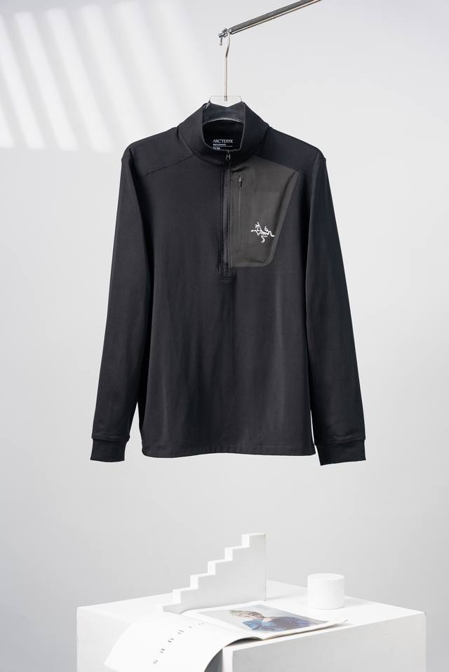 Black Arcteryx Rho series solid color printed logo half zip long sleeve sweatshi