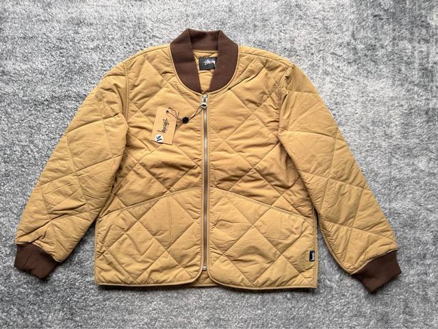 st331# Stussy Fw23 8 Ball Quilted Ted Liner Jacket. Stussy black eight-ball patc