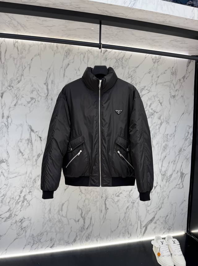 Release price Prada's new jacquard nylon down jacket with a small metal logo. C