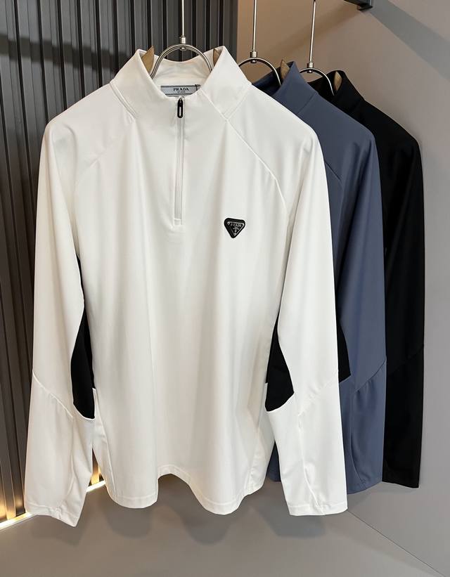 prad*Puda's new Fall/Winter 2025 short-sleeved polo shirt features classic eleme