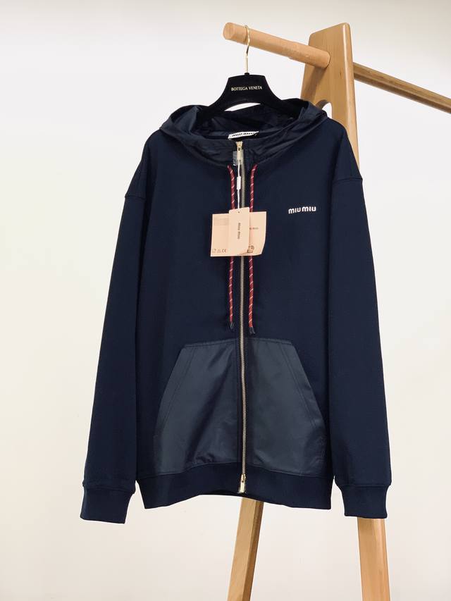 Miumiu's new hooded zip-up sweatshirt jacket from Miu Miu's 2025 Fall/Winter col
