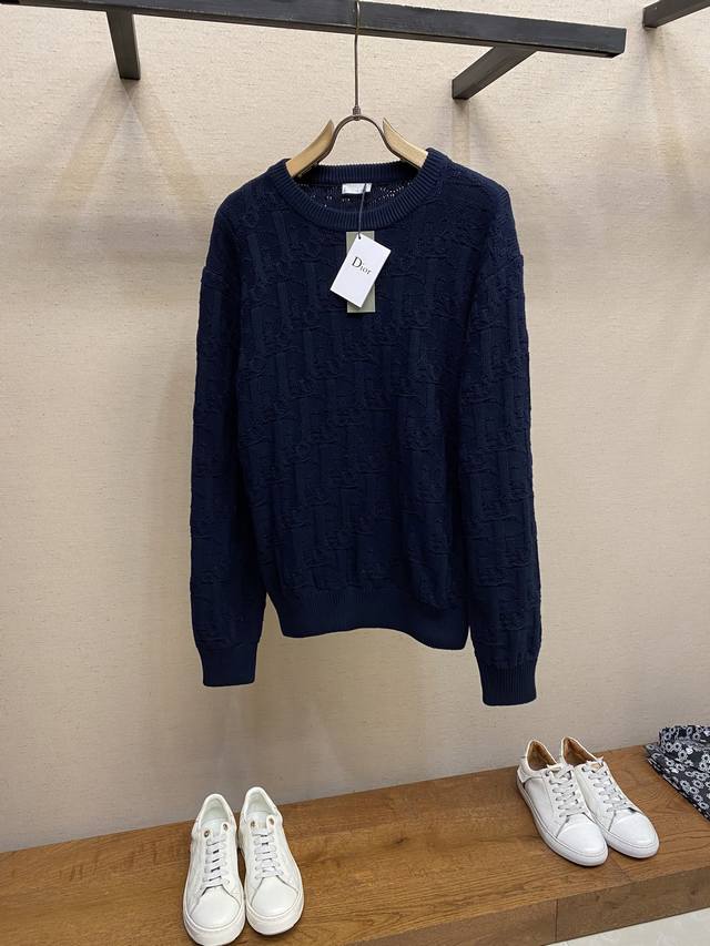 Dior jacquard crewneck sweater. The yarn is made of a wool blend and is speciall